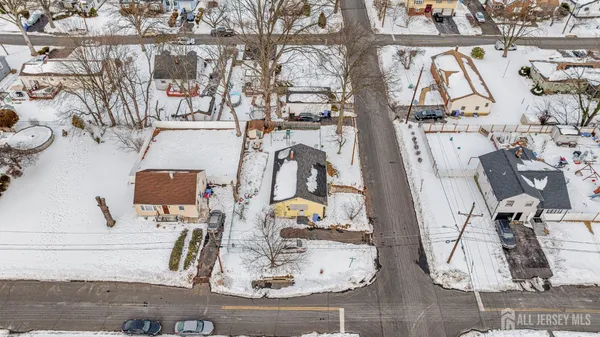a view of living room with furniture and wooden floor
