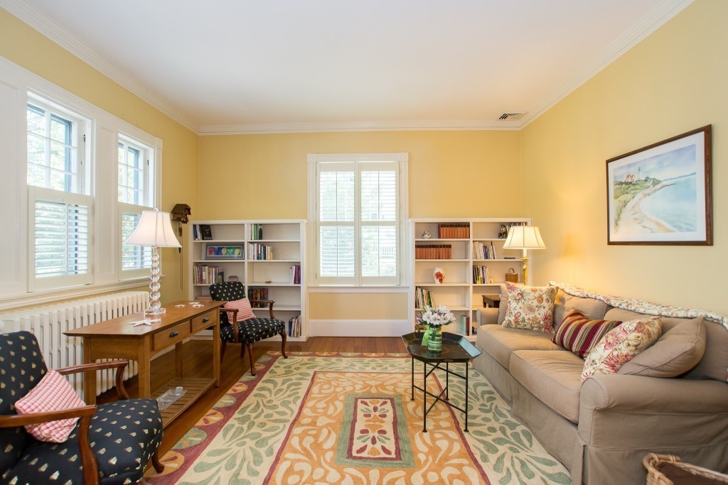 15 West Side Road Milton, MA 02186 - Photo 18 of 28 a living room with furniture and a window