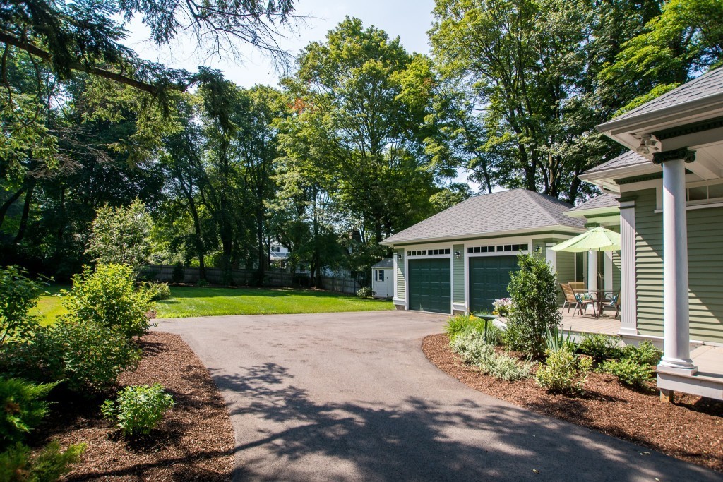 15 West Side Road Milton, MA 02186 - Photo 3 of 28 a view of a house with backyard and a garden
