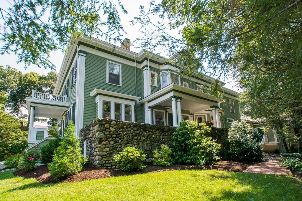 15 West Side Road Milton, MA 02186 - Photo 6 of 28 a front view of a house with a yard
