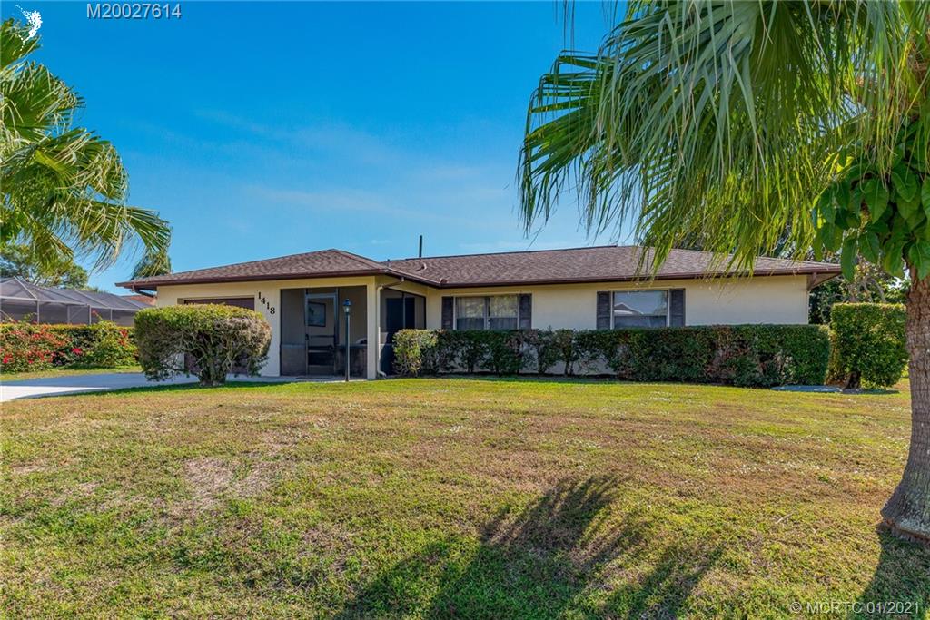 1418 Southeast Santurce Road Port St. Lucie, FL 34952 - Photo 3 of 37