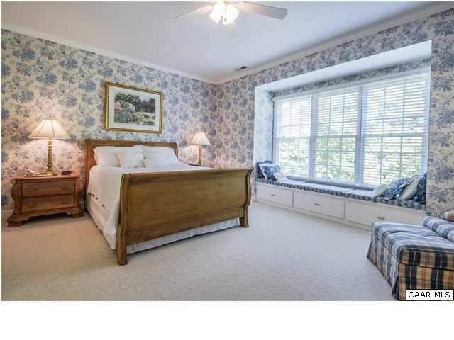 1549 Tavistock Place, Unit R 24 Keswick, VA 22947 - Photo 12 of 31 Enjoy the morning sunshine in the bright sunroom that adjoins the kitchen. It's the ideal place for family dining, curling up with a good book, or emailing. Spacious enough for a sitting area & an eating area, it also has direct access to the rear deck.