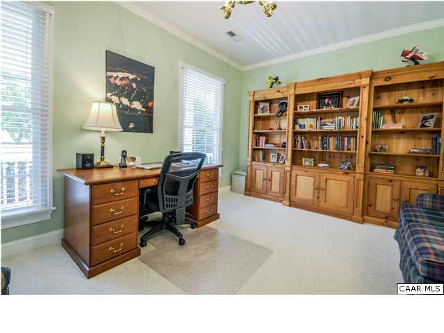 1549 Tavistock Place, Unit R 24 Keswick, VA 22947 - Photo 14 of 31 Coexist peacefully in the large bathroom suite w/his & her walk-in closets/dressing rooms. Both are carpeted, have built-in closet systems, & outlets. "Hers" is a bit larger & is lit by a skylight. "His" has a high window. Separate vanities, tub & shower.