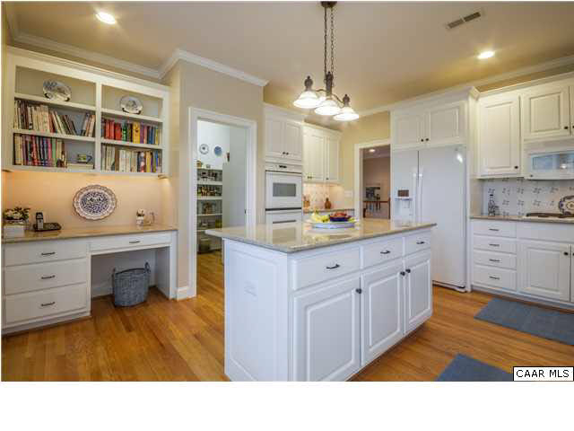 1549 Tavistock Place, Unit R 24 Keswick, VA 22947 - Photo 10 of 31 You'll want to linger all day in the fresh & inviting, kitchen & sunroom combo. This cottage has a unique layout w/huge pantry & additional cabinetry.