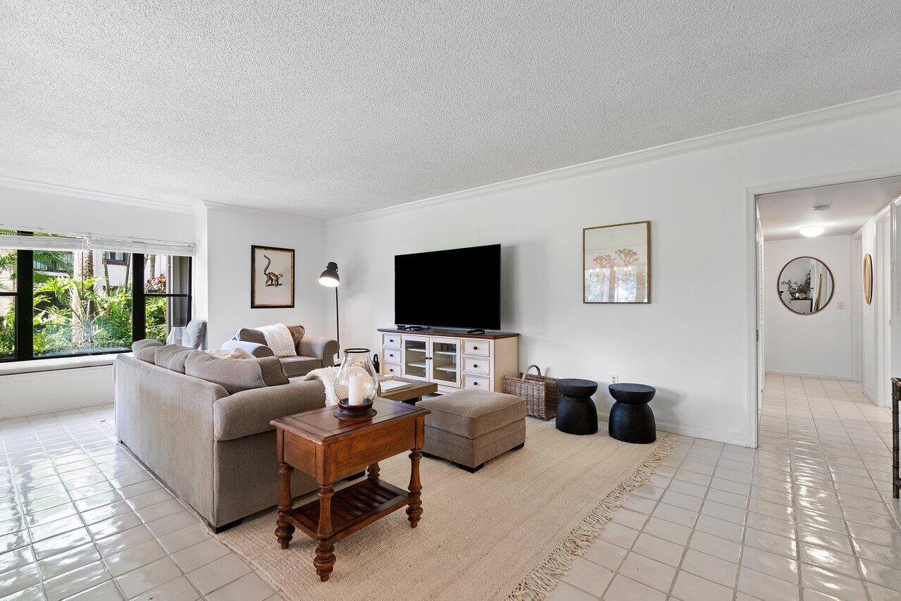 13329 Polo Club Road, Unit 106 Wellington, FL 33414 - Photo 21 of 47 Living room with TV