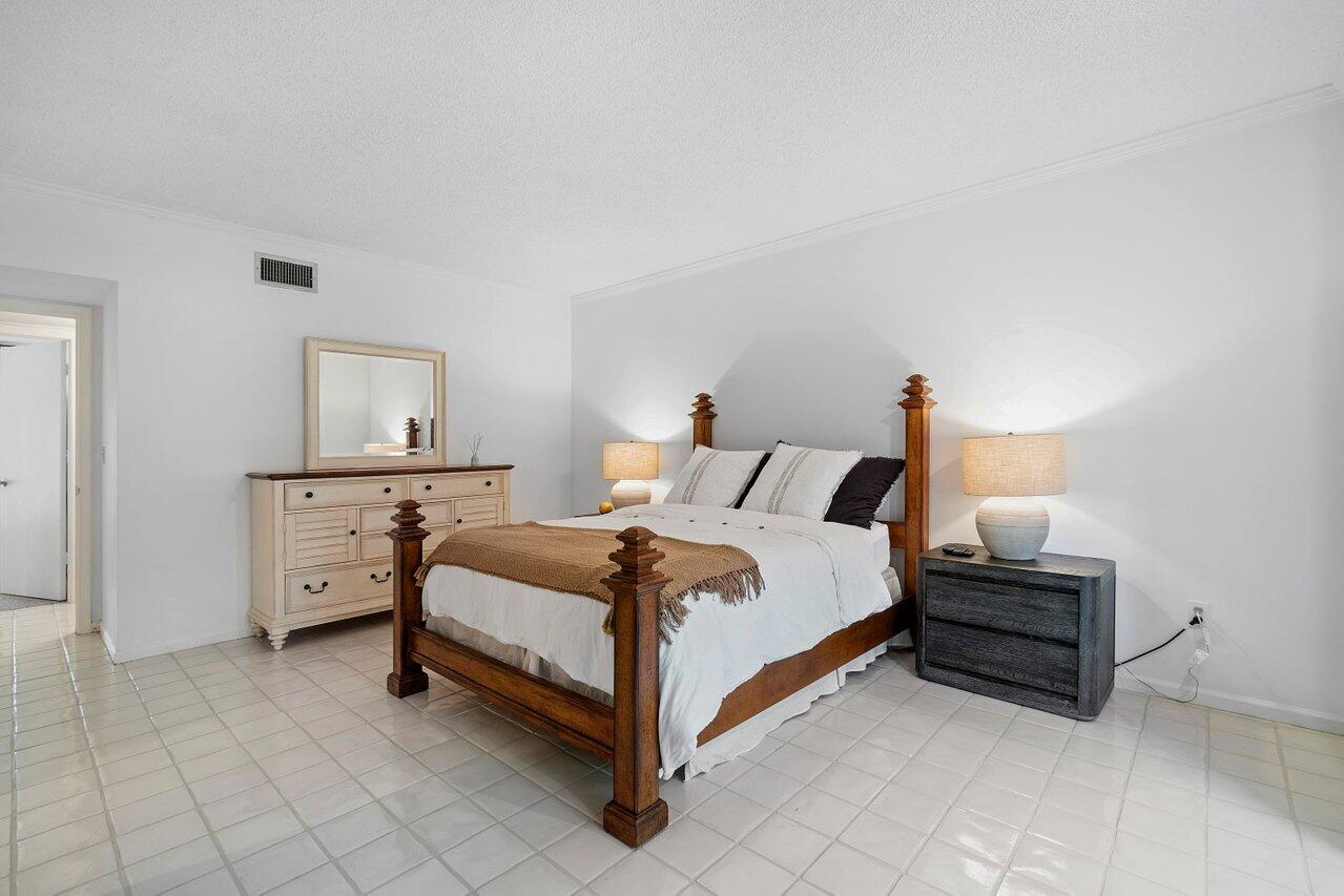 13329 Polo Club Road, Unit 106 Wellington, FL 33414 - Photo 25 of 47 Master bedroom