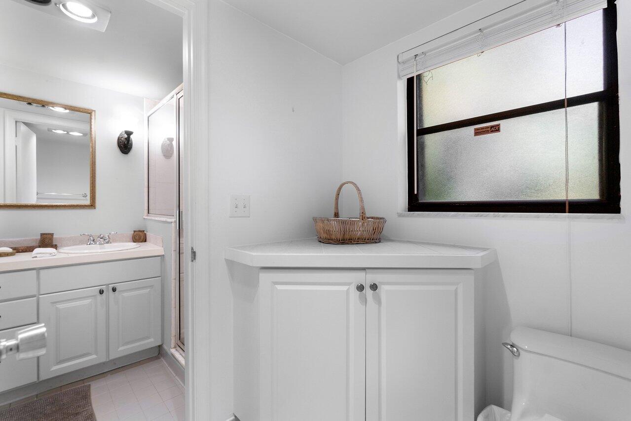 13329 Polo Club Road, Unit 106 Wellington, FL 33414 - Photo 27 of 47 Master bathroom