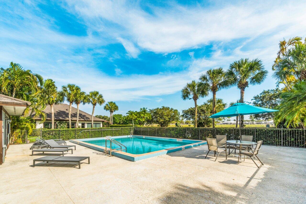 13329 Polo Club Road, Unit 106 Wellington, FL 33414 - Photo 4 of 47 Community pool