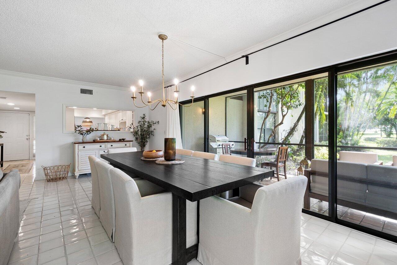 13329 Polo Club Road, Unit 106 Wellington, FL 33414 - Photo 8 of 47 Dining room and kitchen