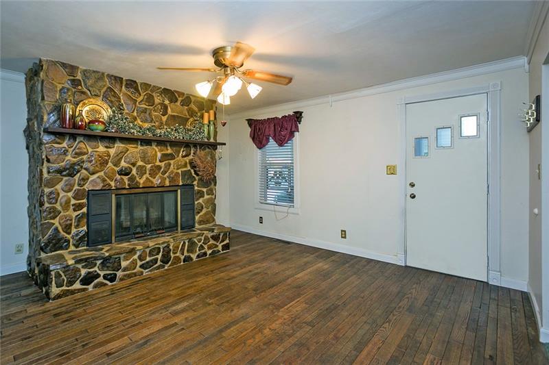 146 Hurst Road Smock, PA 15480 - Photo 4 of 23 Dining Room with Gorgeous Stone Fireplace