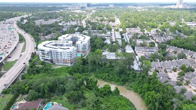 an aerial view of a city with lots of residential buildings