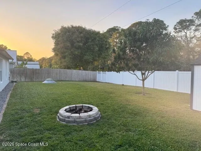 a view of outdoor space and yard
