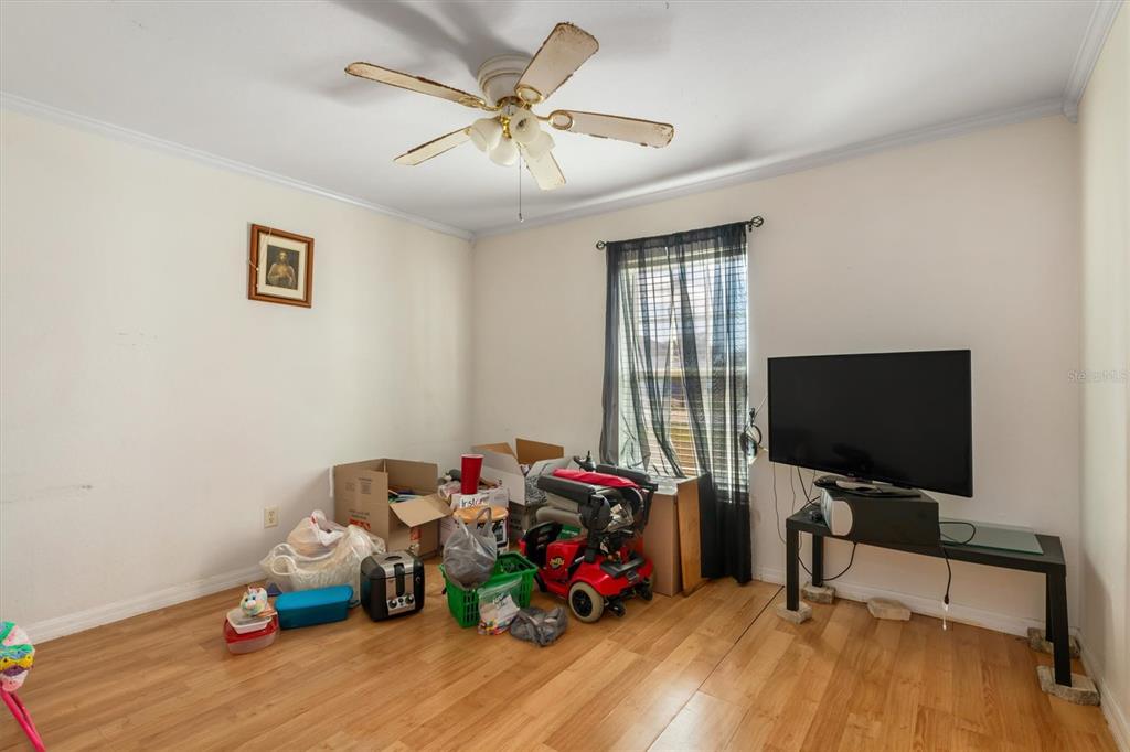 25324 Lychee Court Punta Gorda, FL 33955 - Photo 11 of 30 a room with toys and wooden floor