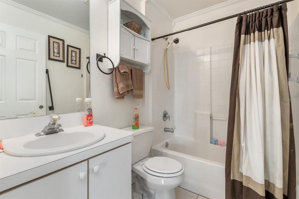 25324 Lychee Court Punta Gorda, FL 33955 - Photo 12 of 30 a bathroom with a sink toilet and shower