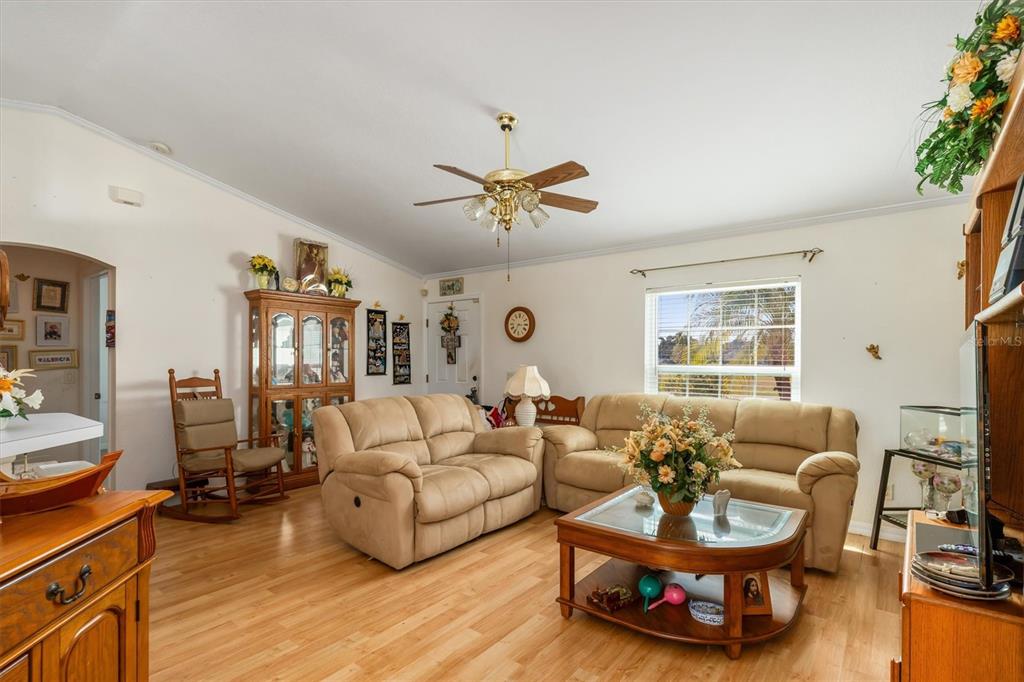 25324 Lychee Court Punta Gorda, FL 33955 - Photo 4 of 30 a living room with furniture and a large window