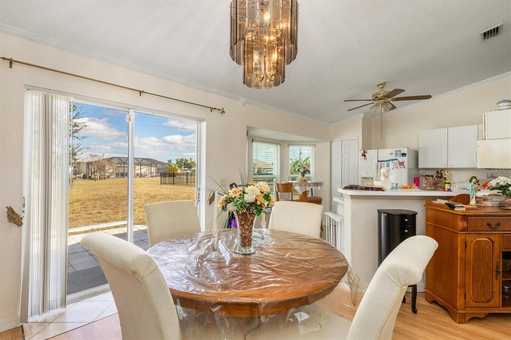 25324 Lychee Court Punta Gorda, FL 33955 - Photo 7 of 30 a view of a dining room with furniture window and outside view