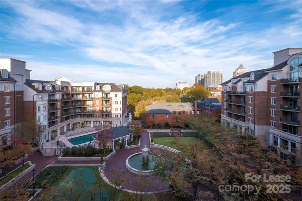 a view of a building with a yard