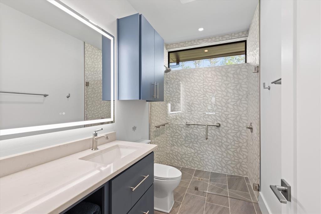 426 Lost Pittsburg, TX 75686 - Photo 24 of 40 a bathroom with a sink a toilet and shower