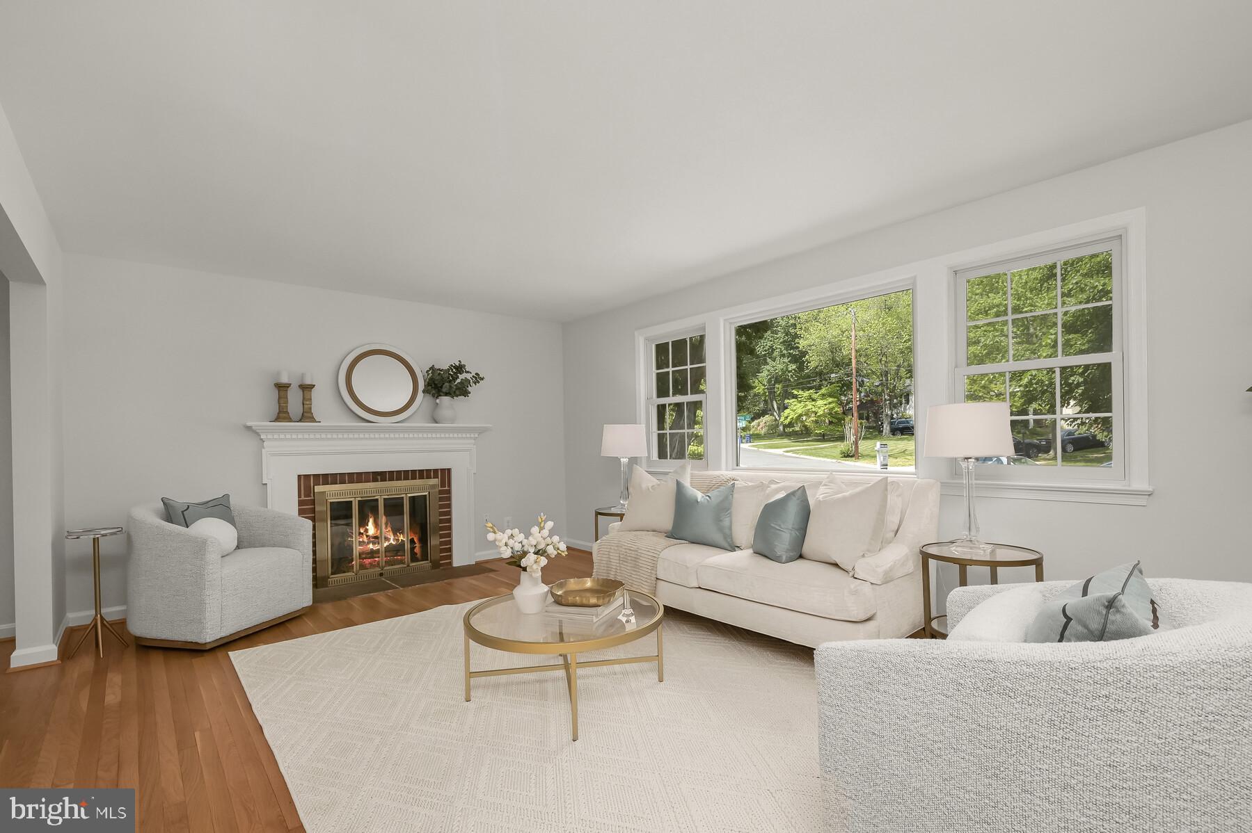 6218 Redwing Road Bethesda, MD 20817 - Photo 7 of 36 Living room with Fireplace