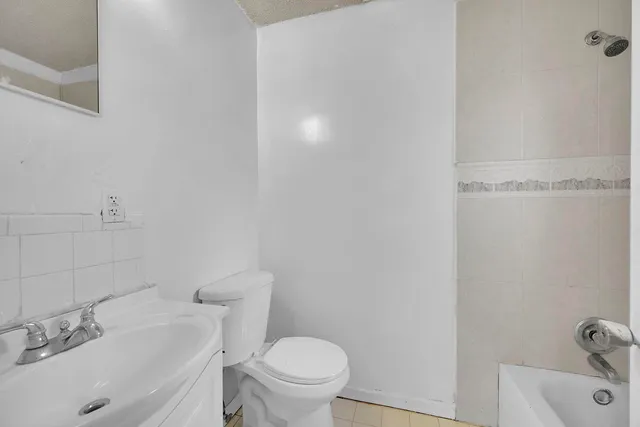 a bathroom with a sink and a toilet