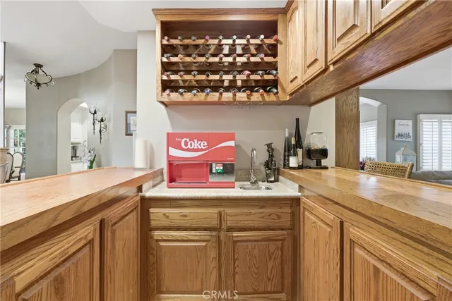 a bathroom with a sink a vanity and a mirror