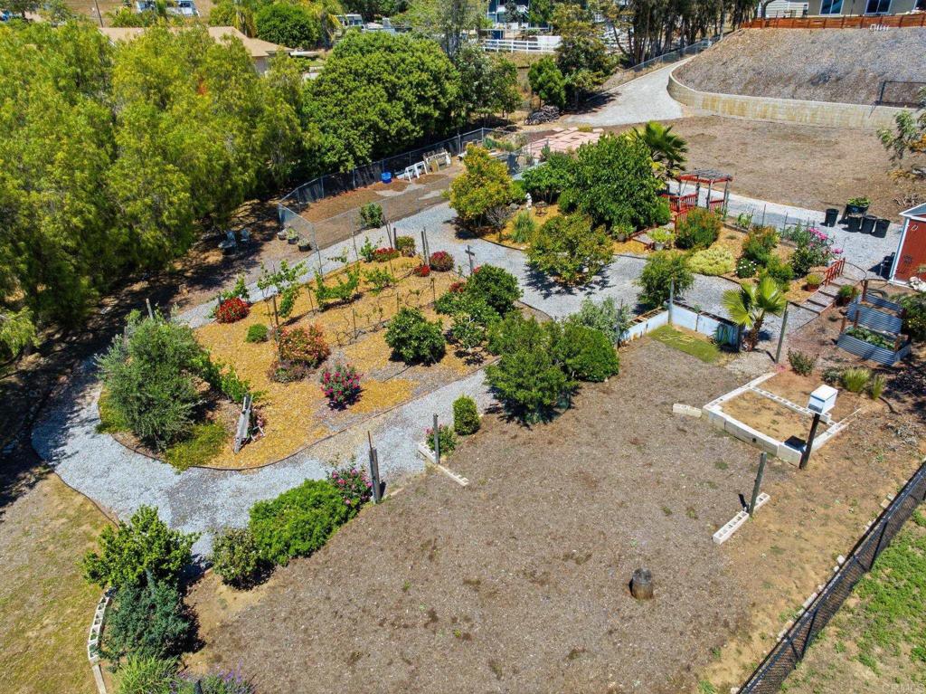 3835 Las Flores Drive Fallbrook, CA 92028 - Photo 64 of 73 an aerial view of a house with a yard