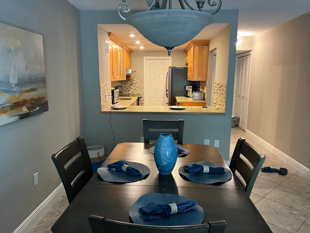 a room with furniture and a mirror