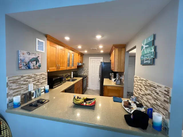 a room with furniture and a flat screen tv