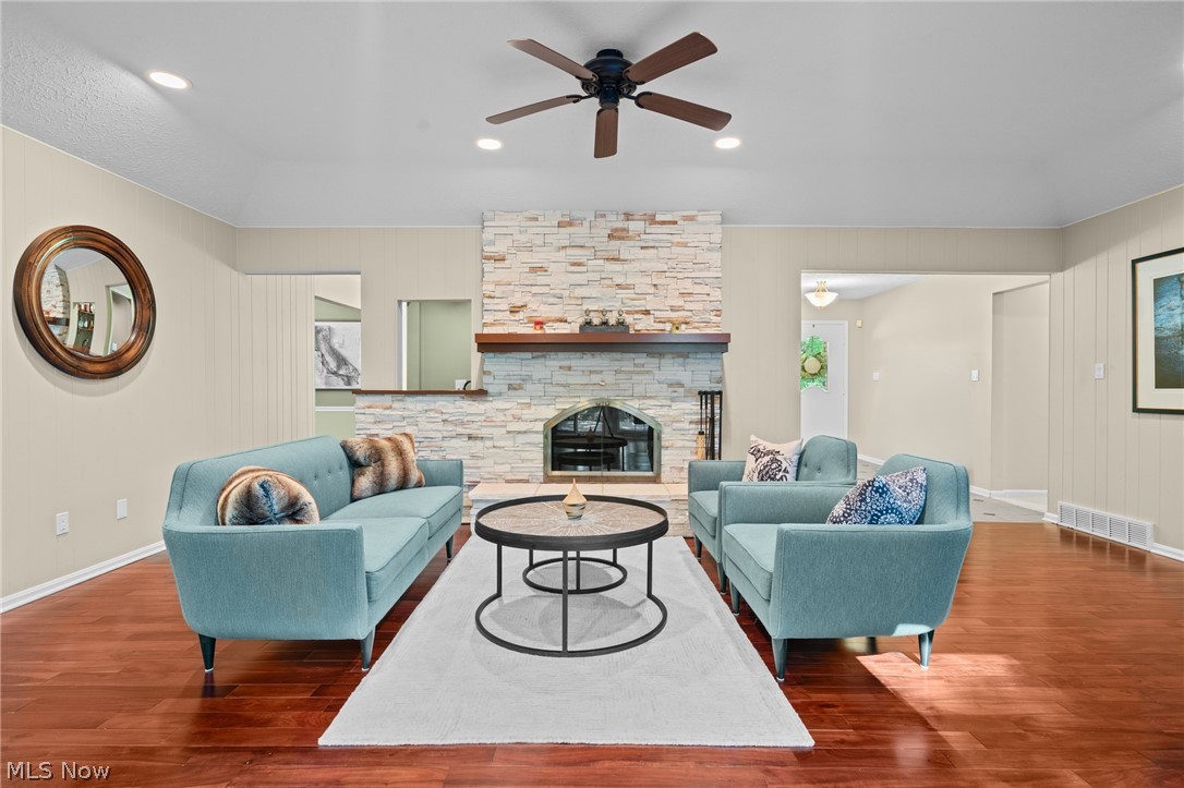 4830 Som Center Road Moreland Hills, OH 44022 - Photo 10 of 48 A cozy lounge built for gathering: a striking stone fireplace anchors the space, while an open flow to the great room keeps the warmth—and the conversation—going.