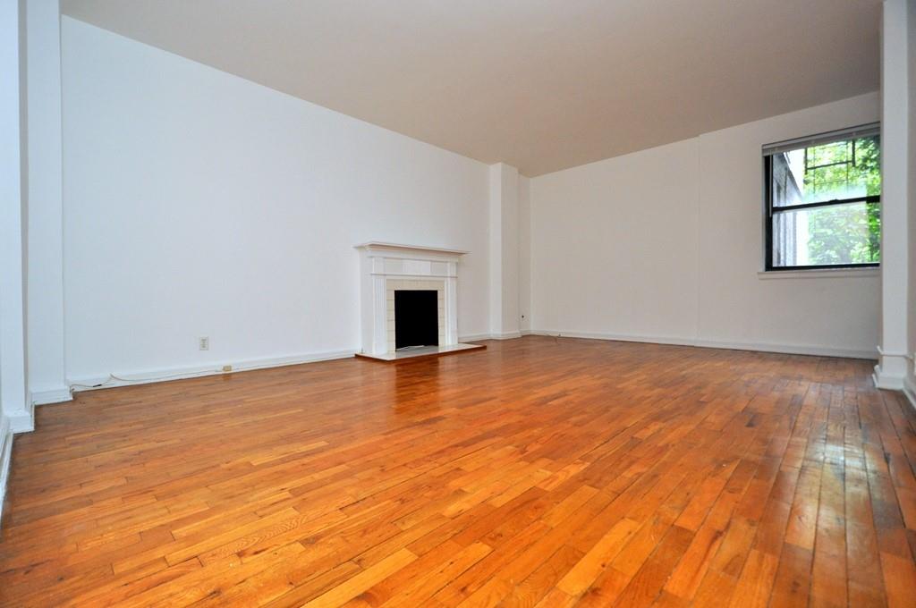 Living Room with hardwood floors.  Room is 19'-0" x 13'-6"