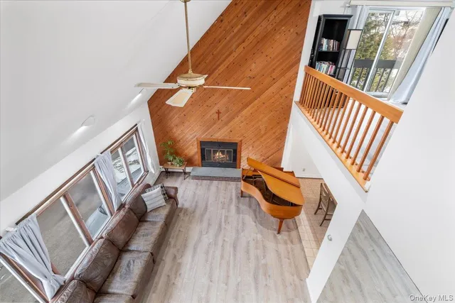 a view of an entryway with wooden floor