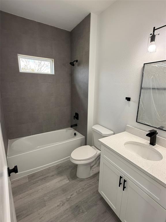 4875 Southwest 159th Lane Ocala, FL 34473 - Photo 20 of 32 a bathroom with a sink toilet and shower