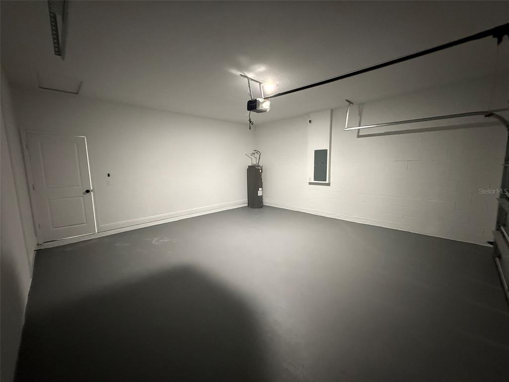 4875 Southwest 159th Lane Ocala, FL 34473 - Photo 24 of 32 an empty room with a empty space and windows