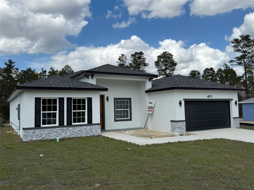 4875 Southwest 159th Lane Ocala, FL 34473 - Photo 27 of 32 a house that has a outdoor space
