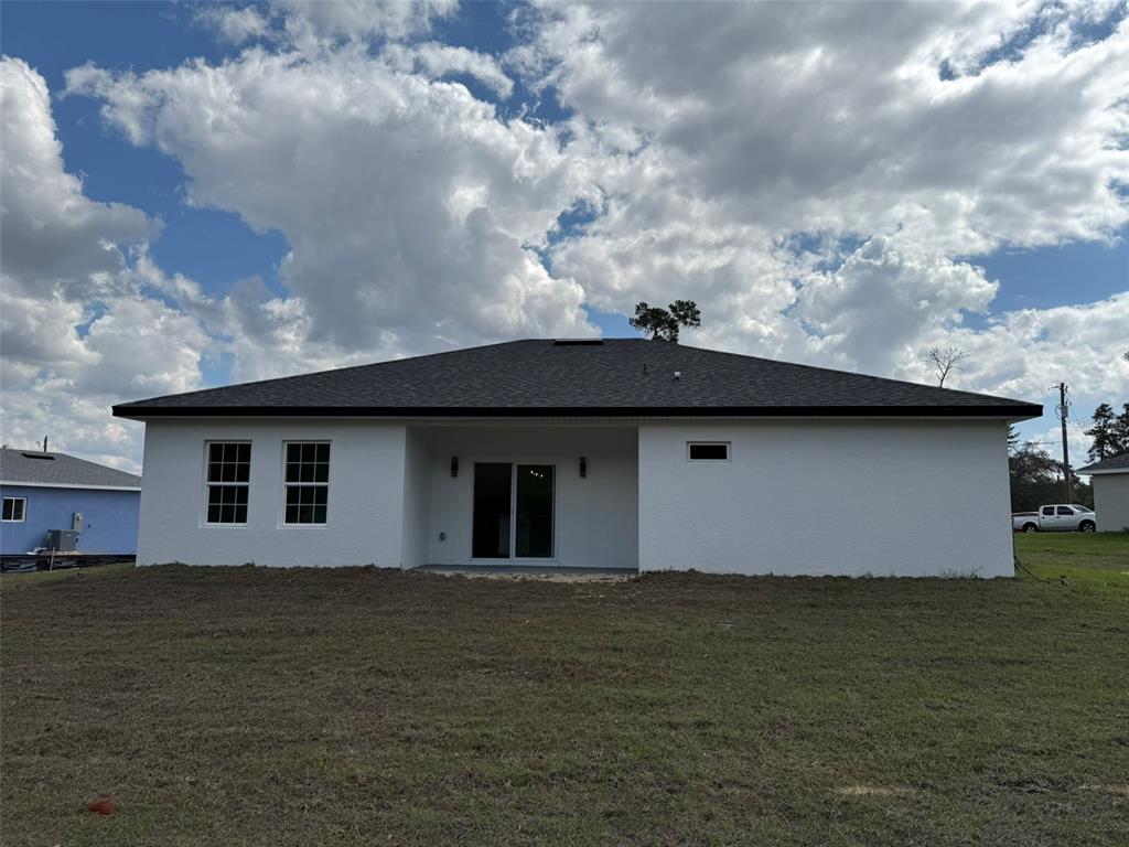 4875 Southwest 159th Lane Ocala, FL 34473 - Photo 29 of 32 a front view of house with ocean