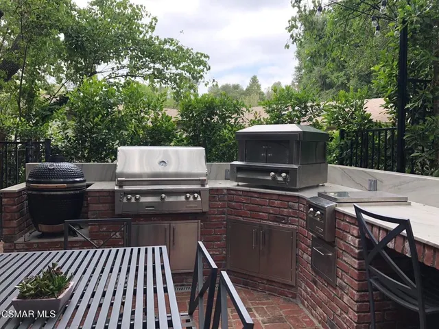 a view of a terrace with furniture