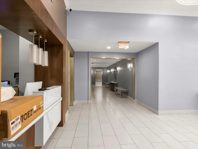 a kitchen with granite countertop a stove and a sink