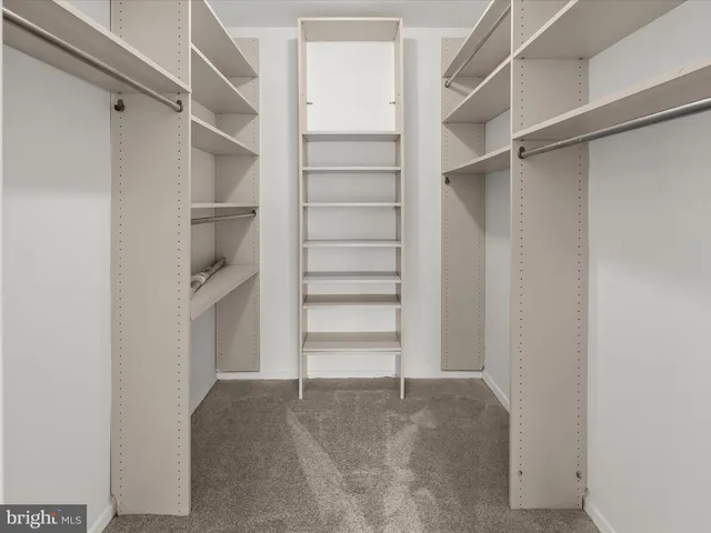 a view of swimming pool with outdoor seating and mountain view