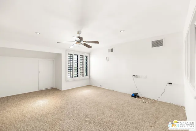 a view of storage and utility room with washer and dryer
