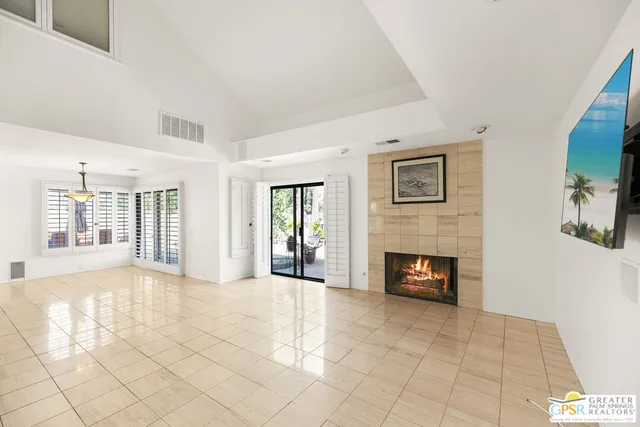 a view of a room with cabinet and windows