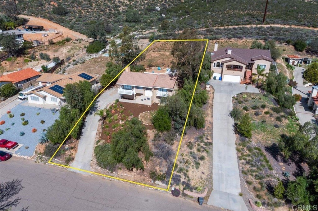 24436 Rutherford Road Ramona, CA 92065 - Photo 1 of 1 an aerial view of residential houses with outdoor space