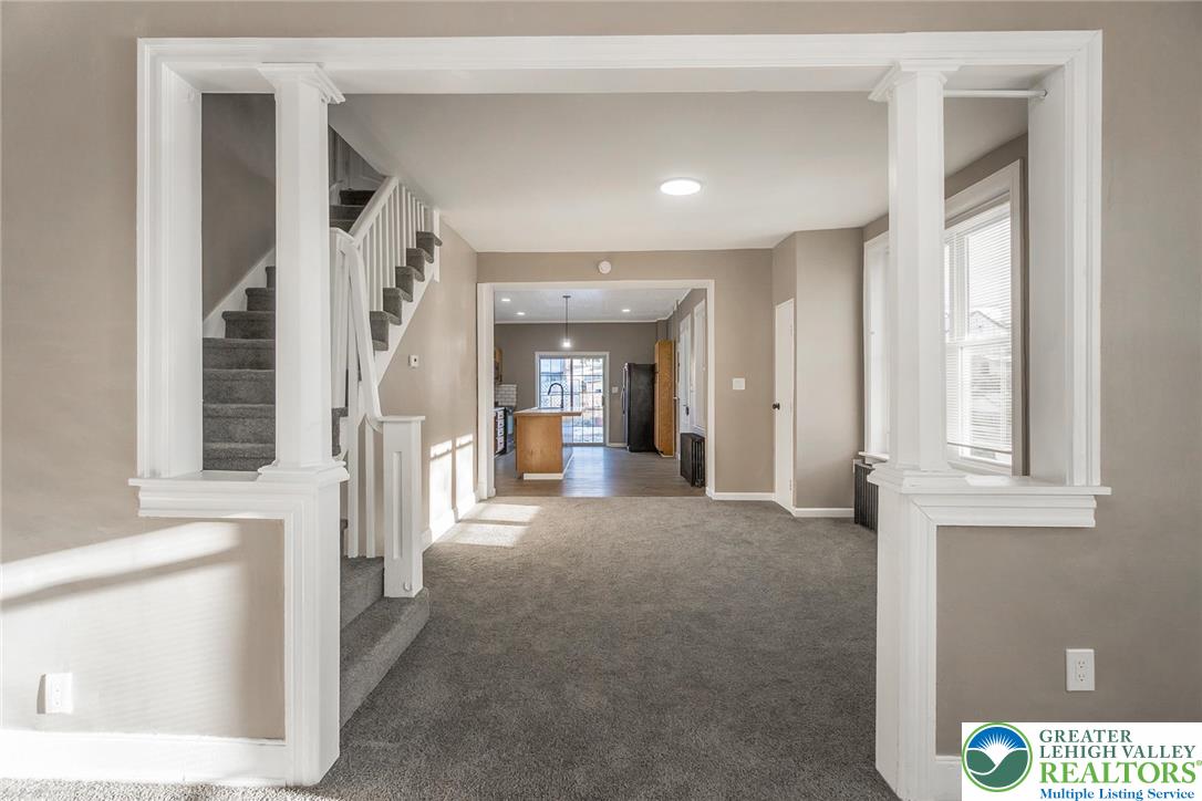 2213 Village Road Orefield, PA 18069 - Photo 18 of 41 a view of a hallway with furniture and windows