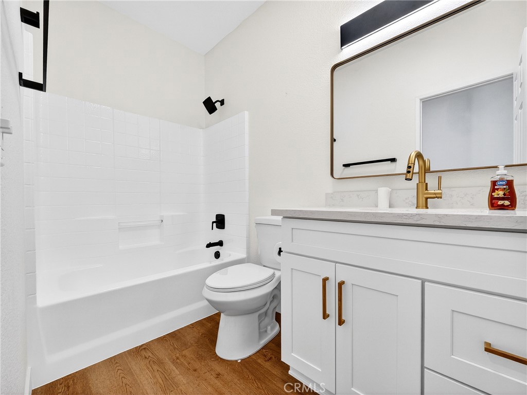 1436 Riviera Avenue Banning, CA 92220 - Photo 26 of 43 a bathroom with a sink and mirror