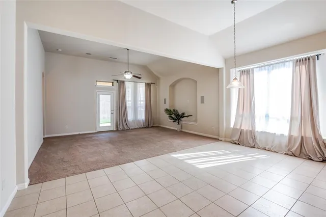 a view of a room with natural light