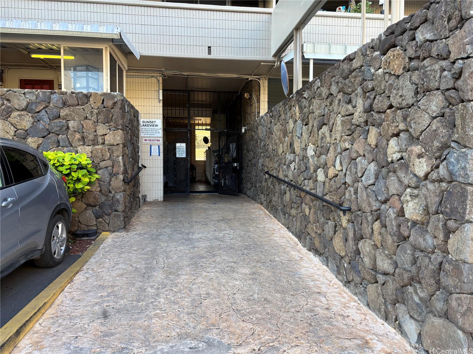 3215 Ala Ilima Street, Unit B404 Honolulu, HI 96818 - Photo 11 of 11 a view of a house with a yard