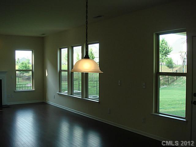 1500 Ridgehaven Road, Unit 147 Waxhaw, NC 28173 - Photo 4 of 14 a view of a livingroom with furniture and a window