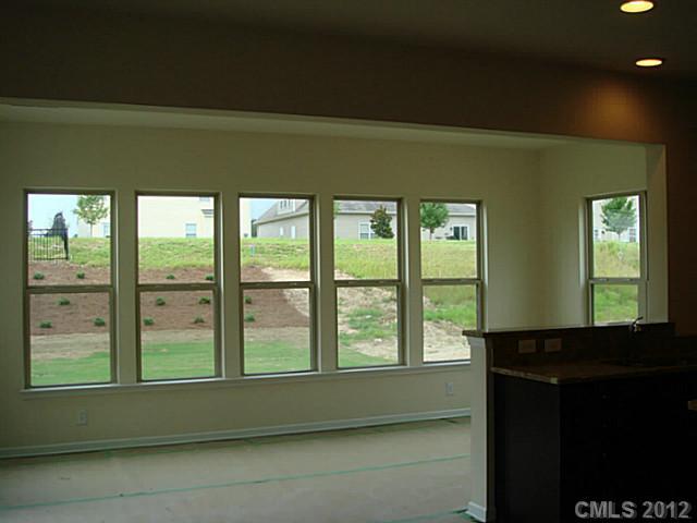 1500 Ridgehaven Road, Unit 147 Waxhaw, NC 28173 - Photo 6 of 14 a living room with a large window