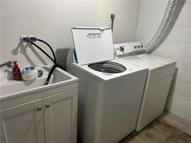 a utility room with dryer and washer