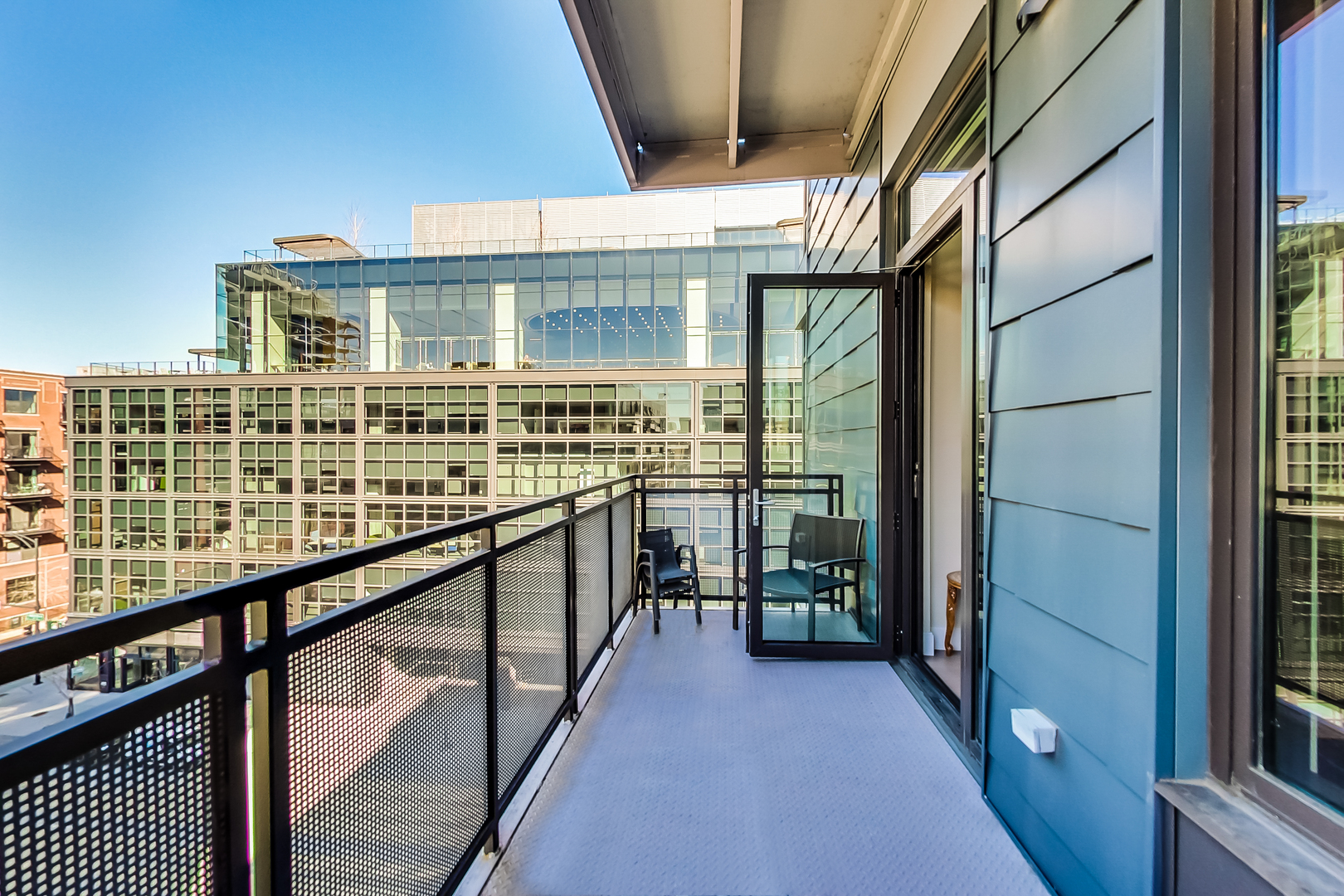 40 North Carpenter Street, Unit 5N Chicago, IL 60607 - Photo 16 of 29 a view of balcony with city view