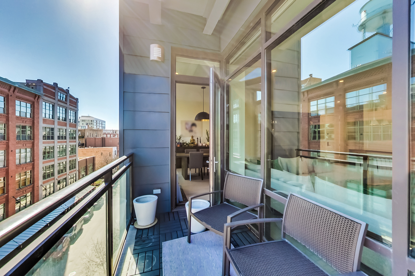 40 North Carpenter Street, Unit 5N Chicago, IL 60607 - Photo 17 of 29 a room with wooden floor and furniture